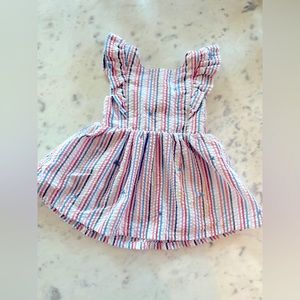 4th of July Striped red white blue seersucker dress with embroidered blue stars.